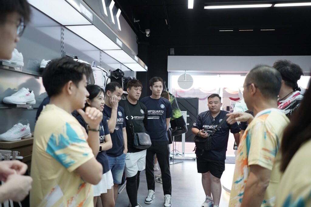 The PRIND Austin JB team gathered together inside the store